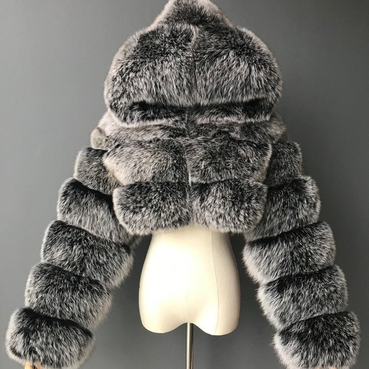 Manteau femme élégant à capuche et fourrure