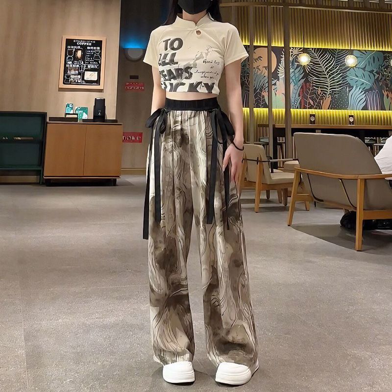 Pantalon large en soie glacée avec motif peinture à l'encre Guo Feng