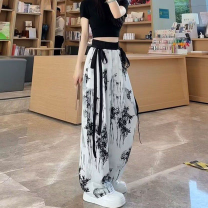 Pantalon large en soie glacée avec motif peinture à l'encre Guo Feng