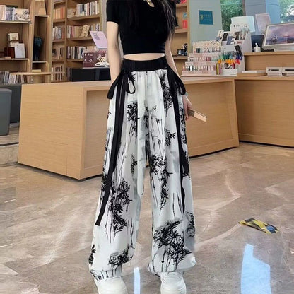 Pantalon large en soie glacée avec motif peinture à l'encre Guo Feng